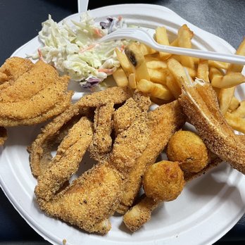 Lassis Inn signature dishes Buffalo Ribs (fried fish steaks), Catfish Fillets, French Fries